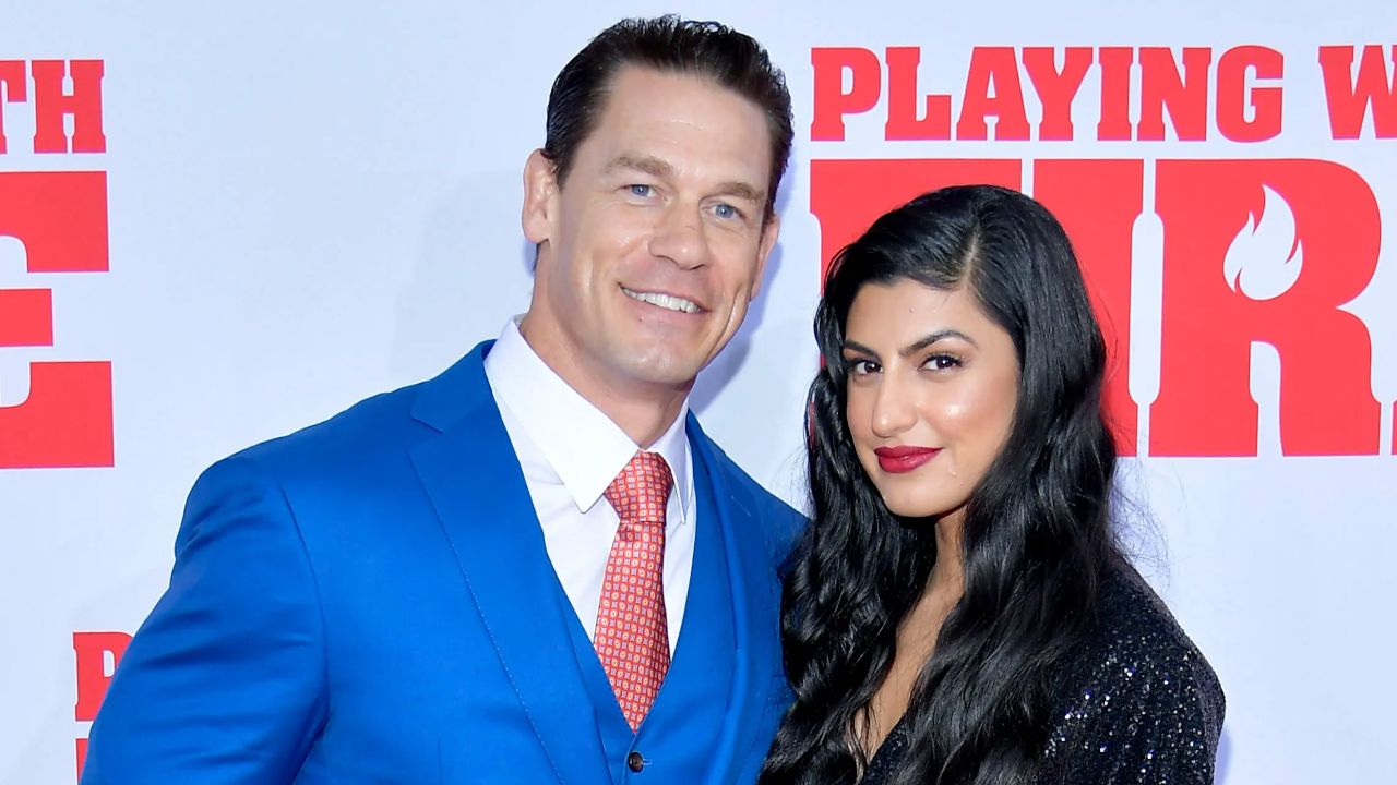 John Cena on the red carpet premiere with his then-girlfriend (current wife) Shay Shariatzadeh 