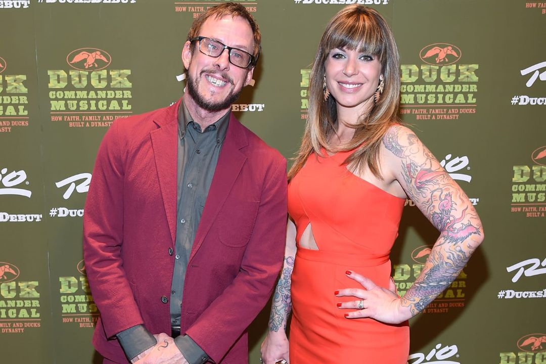 Jillian Lauren Shriner, wife of Weezer bassist Scott Shriner—a cancer survivor and author—was shot by police in a chaotic confrontation after allegedly raising a gun during a suspect search.