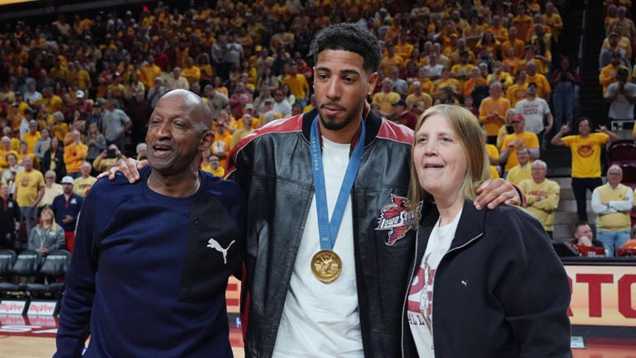 Tyrese Haliburton with his dad, John Haliburton, and his mom, Brenda Haliburton.