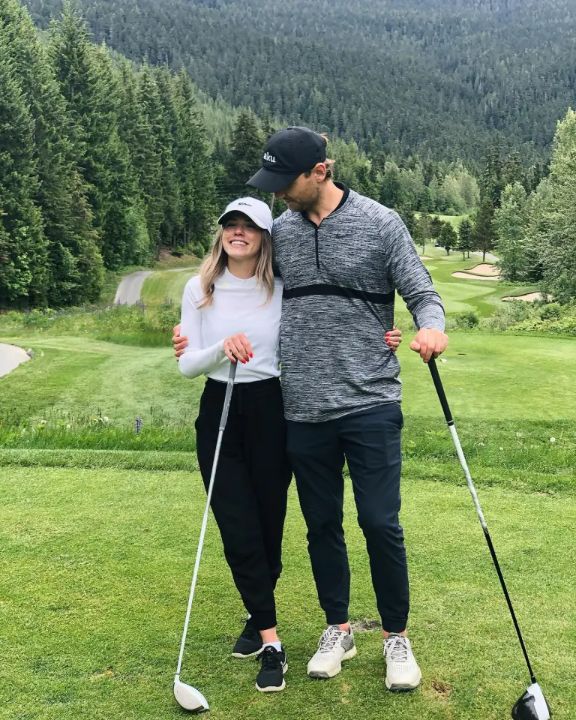 Sam Reinhart with his wife, Jessica Jewell.