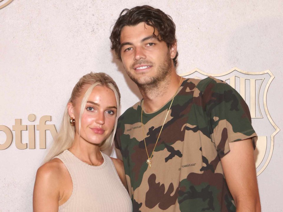 Taylor Fritz with his girlfriend, Morgan Riddle.